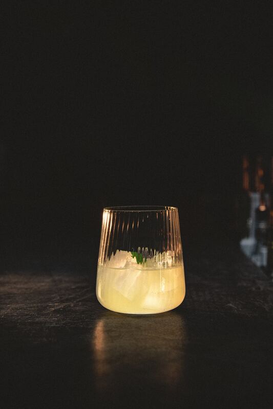 Gin sour over a single block of ice